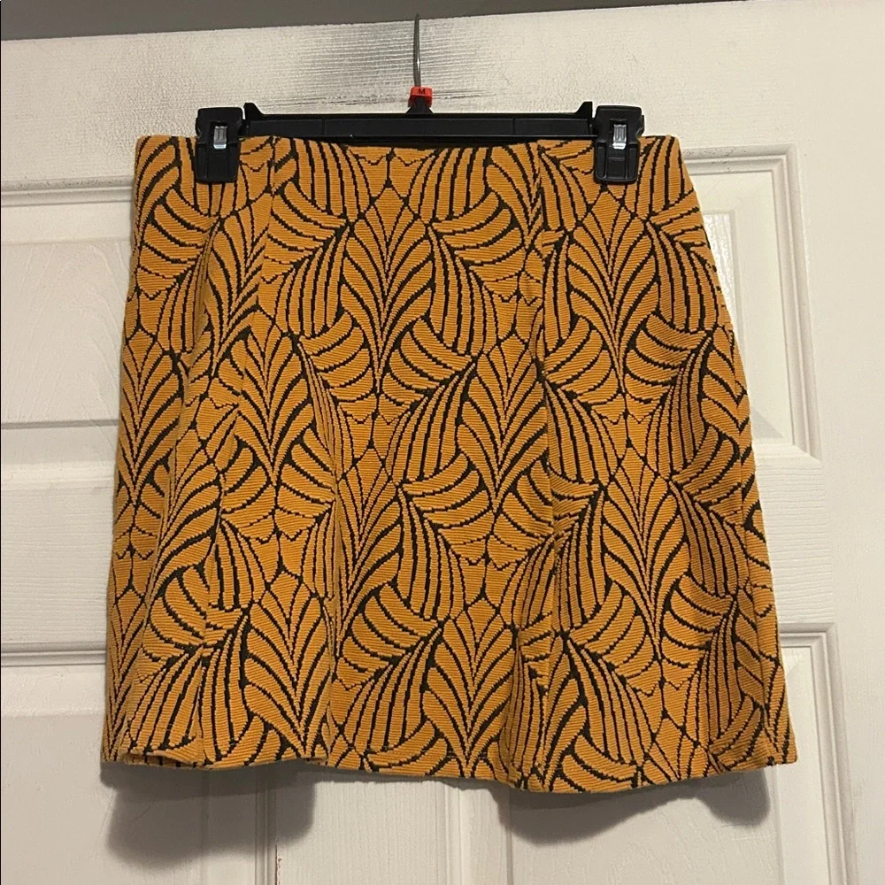 Stradivarius A-Line Mini Skirt Size Medium In Orange with Black Leaf Pattern